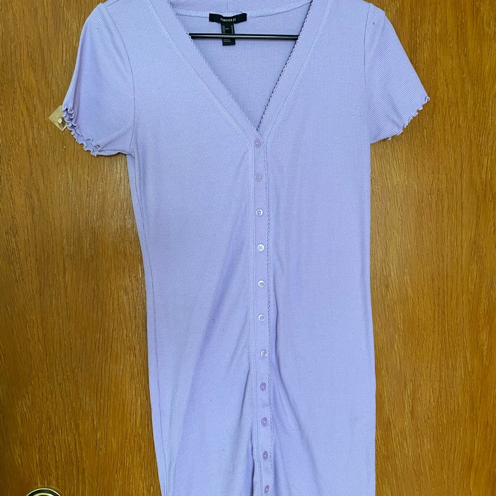 Purple ribbed dress with buttons all up the front.